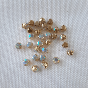 Cristales Blanco Tornasol Base Dorada 3mm